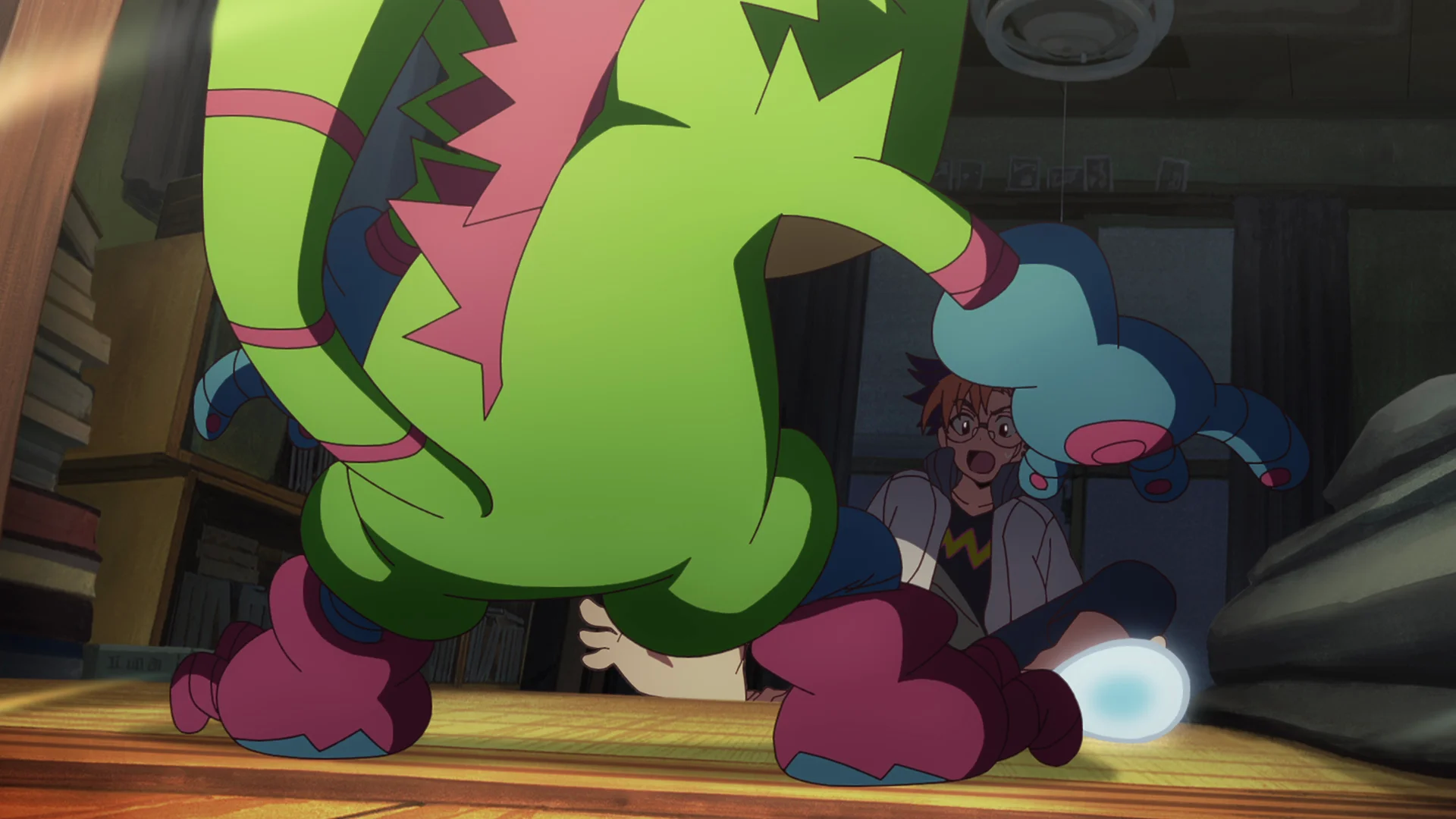 Anime scene with a startled character facing a green, pink, and blue creature in a room.