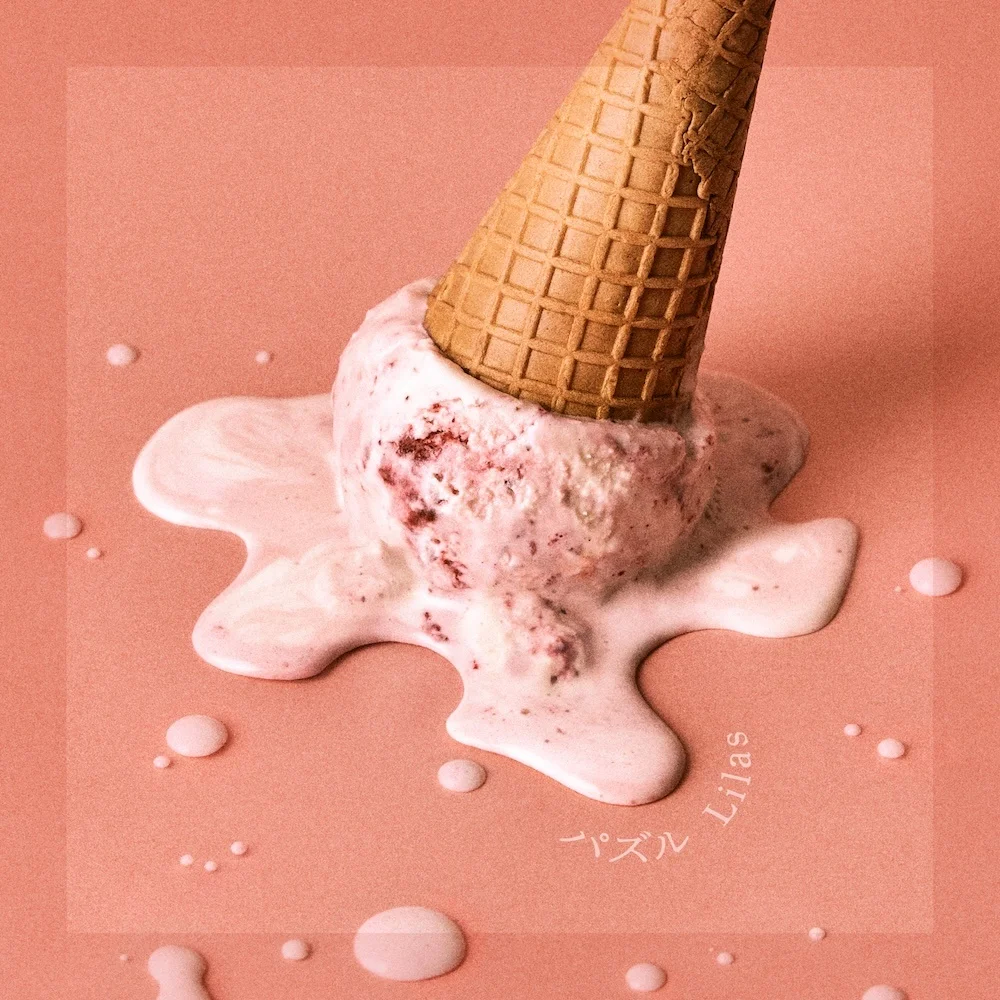 गुलाबी सतह पर पिघलता आइसक्रीम कोन, पाठ パズル Lilas
