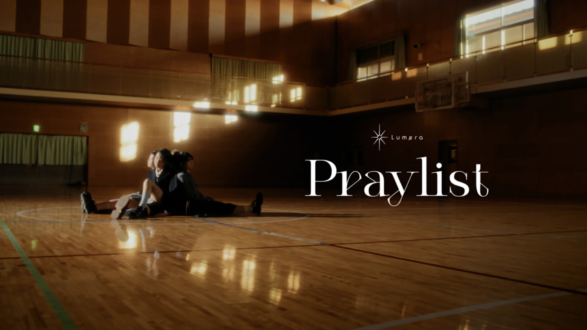 Lumera Praylist music video scene in a gymnasium