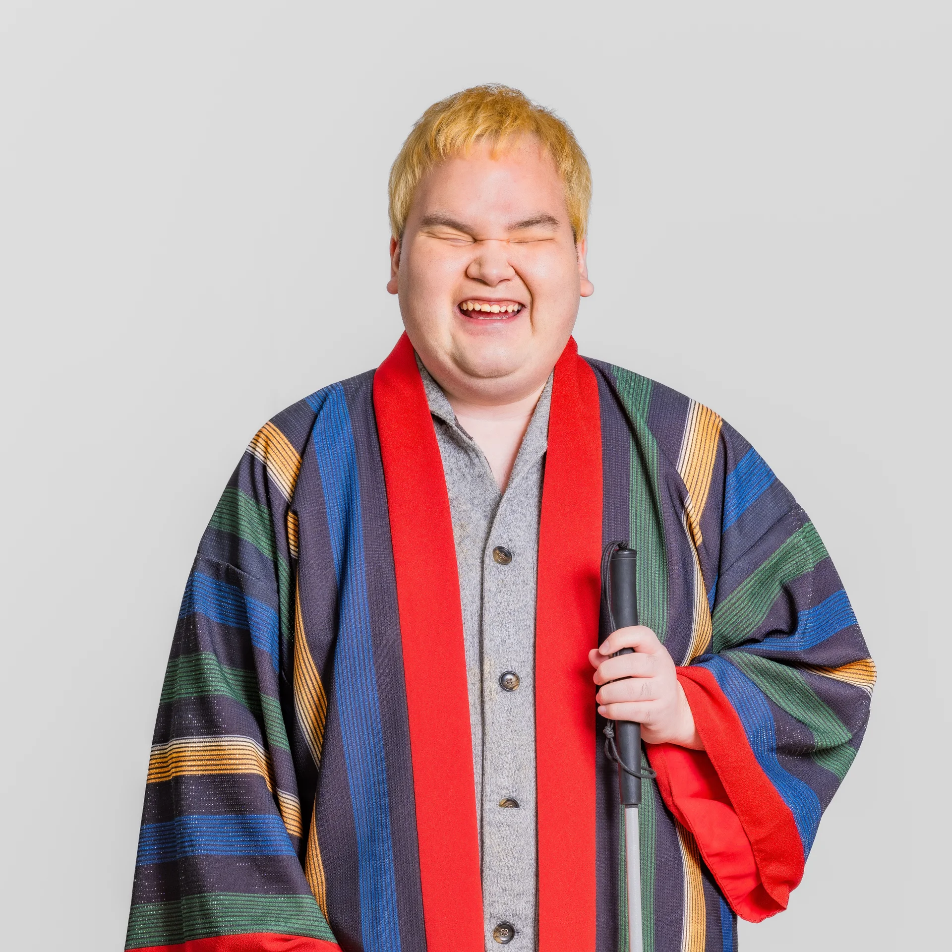 A participant smiling in a colorful kimono