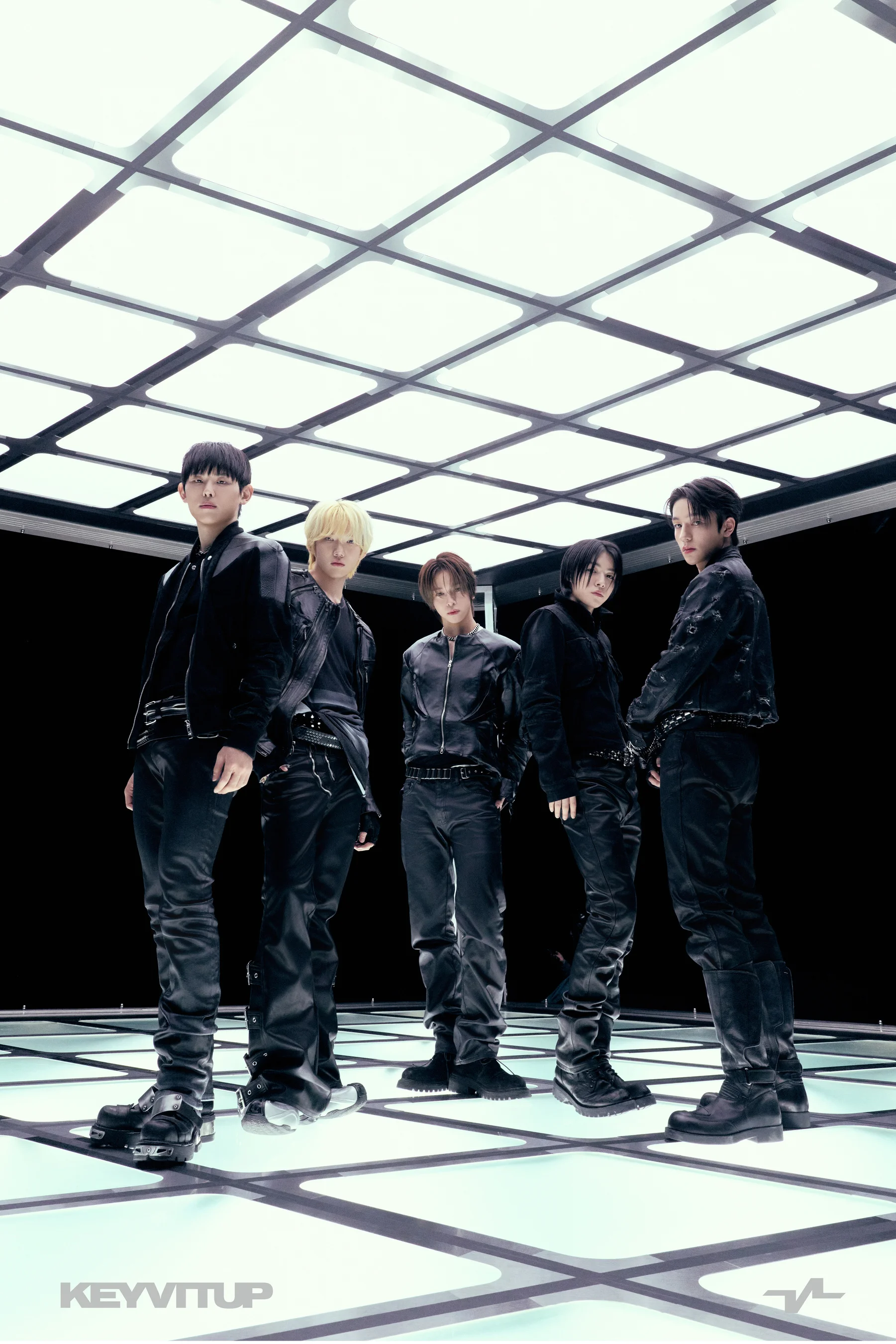 KEYVITUP members pose in a futuristic room