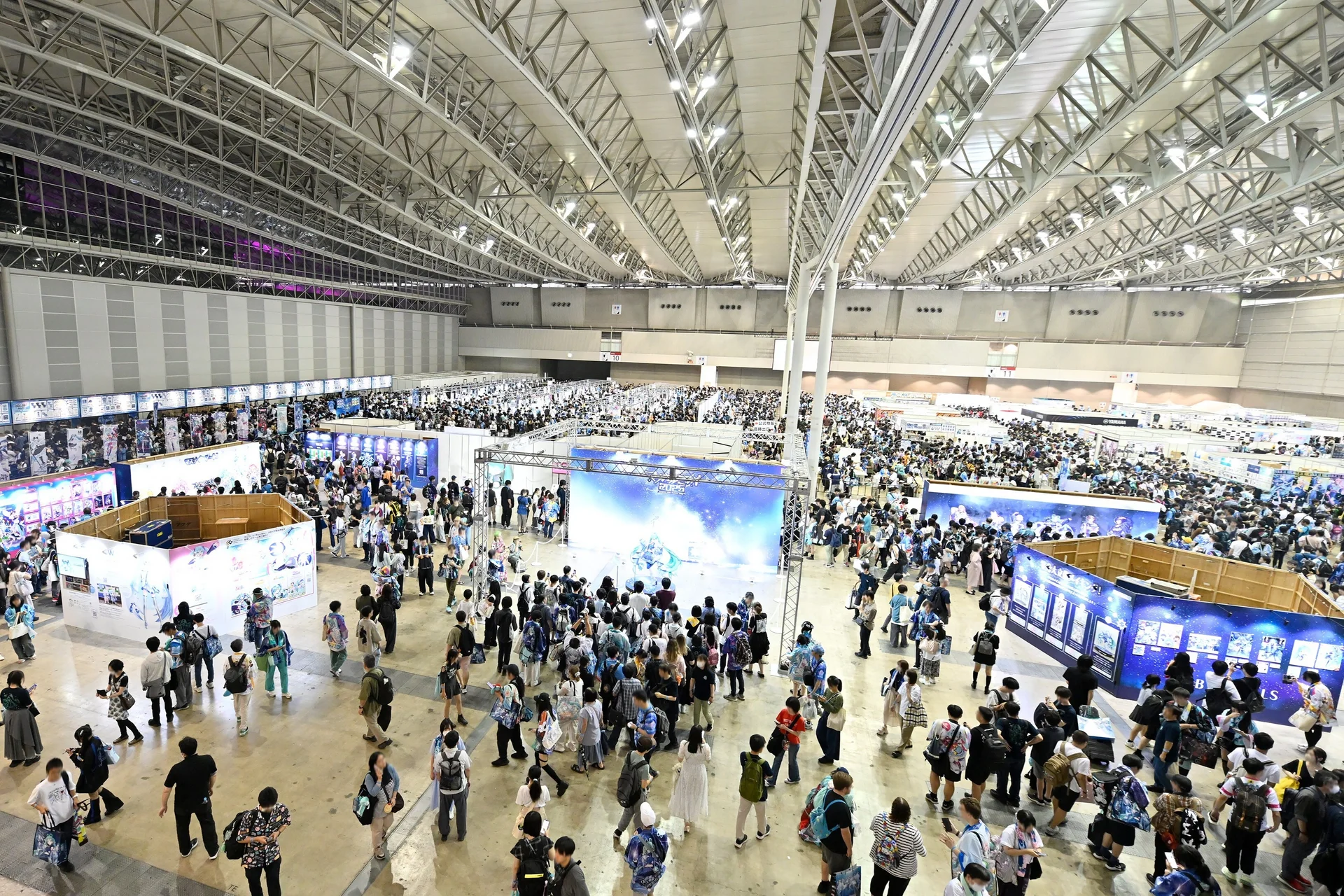 Magical Mirai exhibition hall with attendees and booths