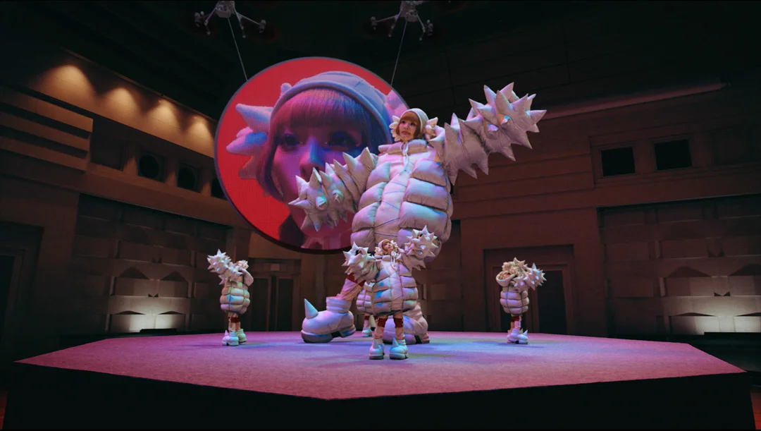 Kyary Pamyu Pamyu on stage in a spiky white costume