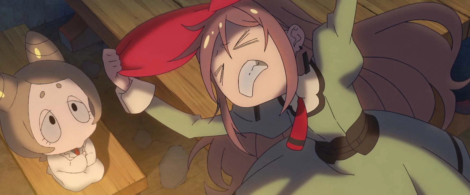 A girl with a red ribbon lies on a wooden floor next to a small creature