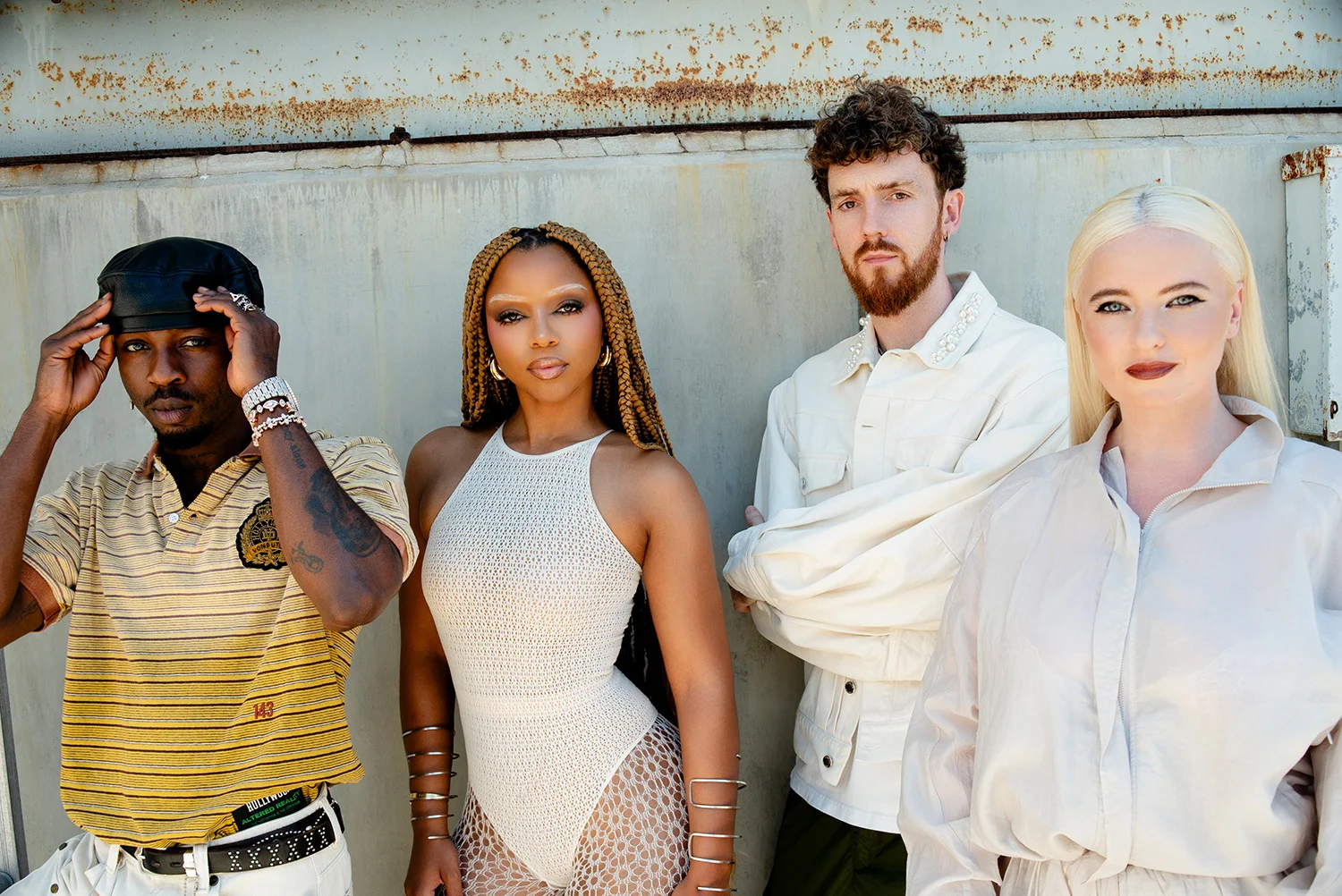 Clean Bandit, Chloe, and Omah Lay pose for the new single