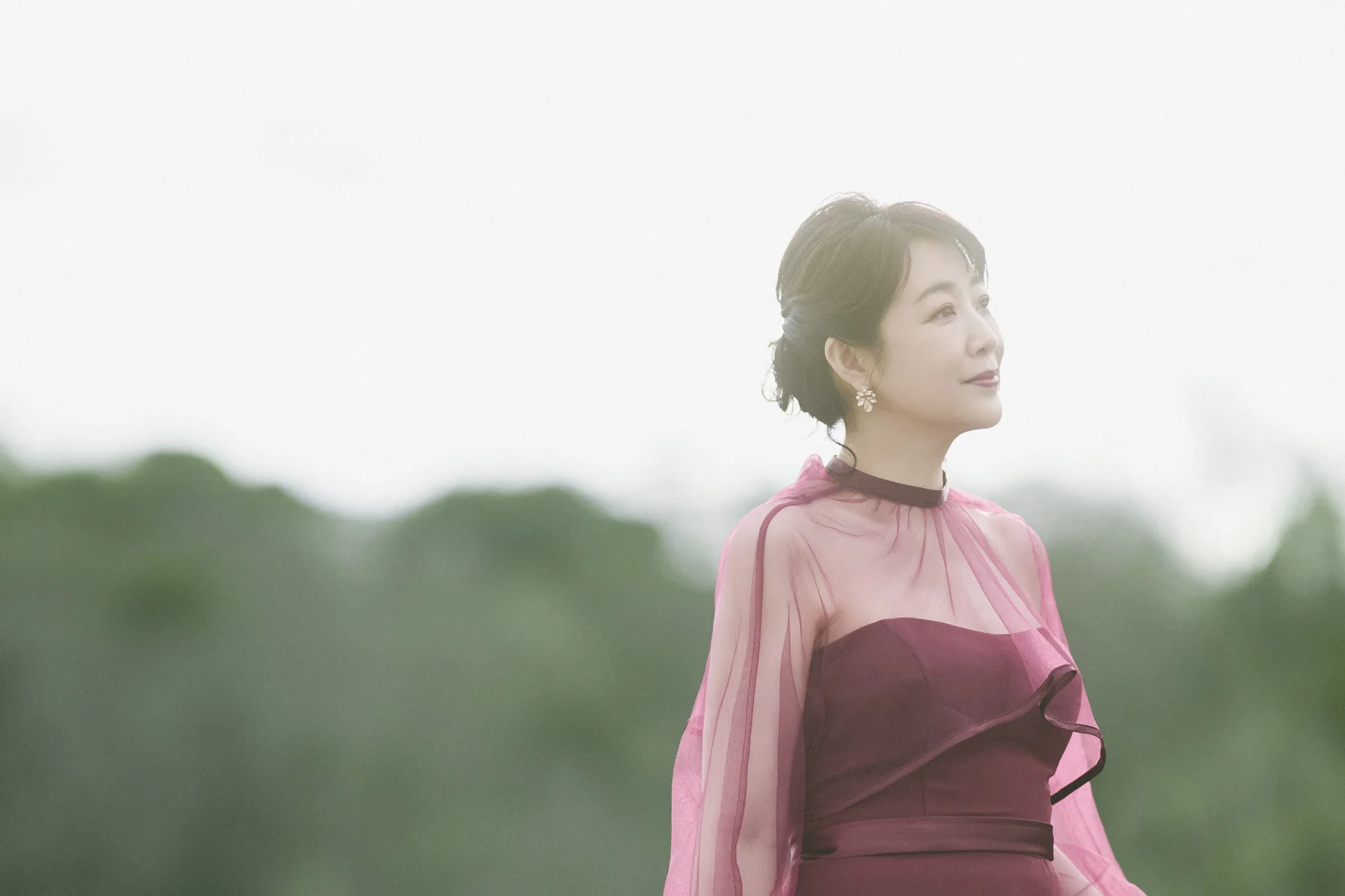 Momoko Kikuchi in a pink dress