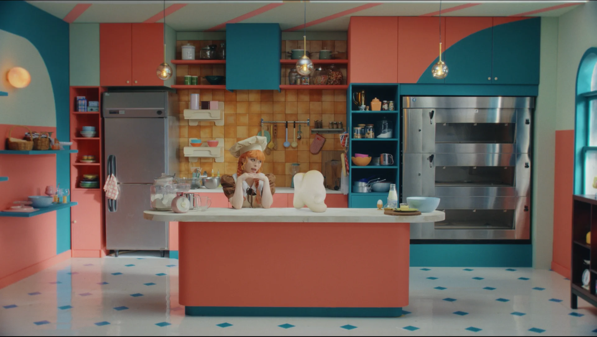 A colorful kitchen scene with a chef character and cartoon bread on a counter