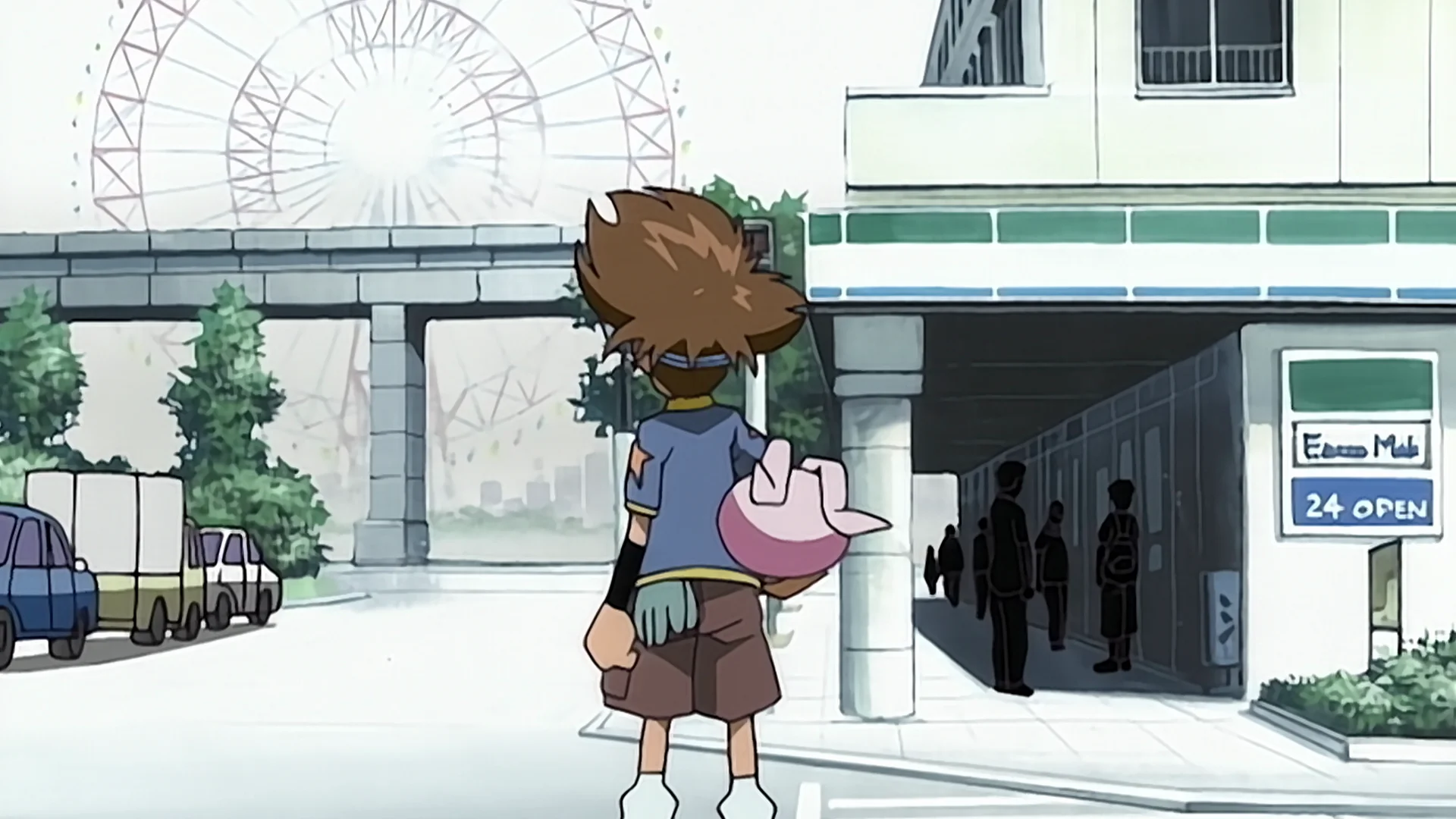Personnage d’anime debout devant l’entrée d’un centre commercial près d’une grande roue